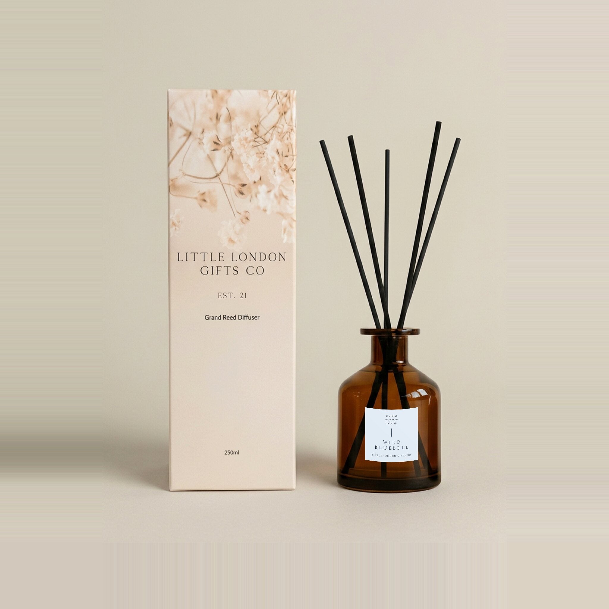 English Bluebell 250ml reed diffuser in amber glass with a pale blue label, black reeds and a tall cream gift box