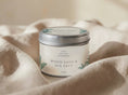 Load image into Gallery viewer, Sage & Sea Salt candle tin 211ml with the lid on, resting on draped cream linen
