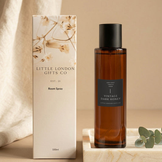 Vintage Dark Honey room spray 100ml with its Little London Gifts Co gift box, styled with linen and eucalyptus